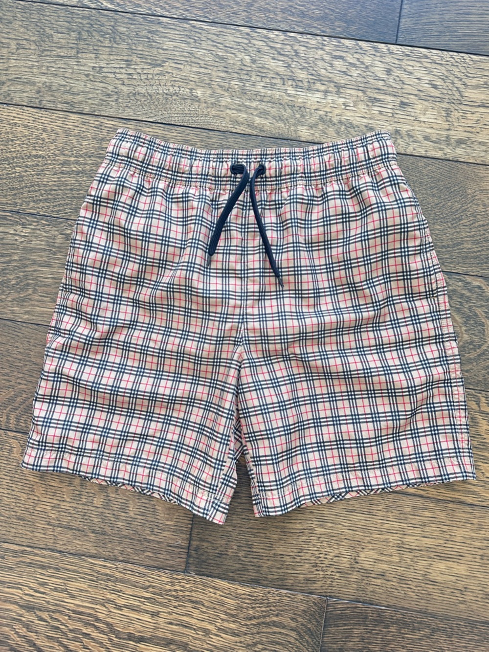 Burberry Kids Plaid Swim Trunks in Black, Red, Tan